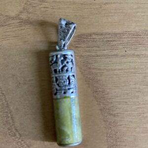 Jade and sterling silver pendant from Peru.